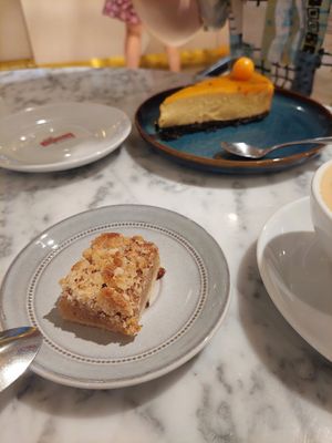 Apple "pie", passionfruit cheesecake oreo cake base. at Kafé Plattan in Stockholm