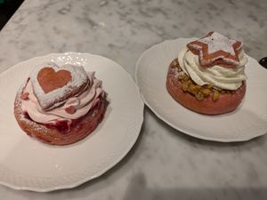 Strawberry semla on the left, traditional semla on the right at Kafé Plattan in Stockholm