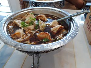 Hot pot with spinach and tofu dumplings at Mormors Dumplings in Stockholm