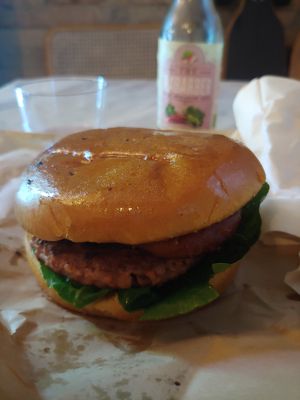 Veg burger with sodavand at Plant Food in Aarhus