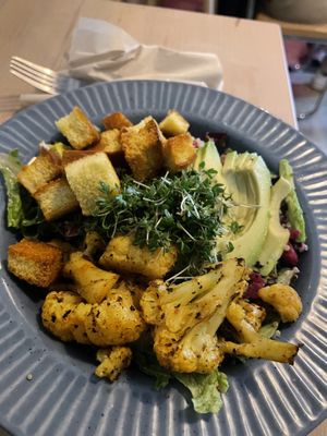 Cajun cauliflower with additional avocado  at Plant Food in Aarhus