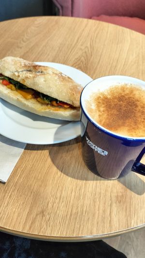 Hummus sandwich and chai latte at Wayne's Coffee in Berlin