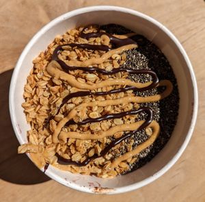 Acai Berry smoothie bowl with granola, chia seeds, chocolate drizzle, and peanut butter drizzle at Asava Juice & Smoothies in Kanab