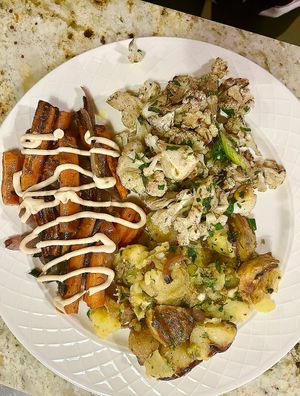 Pick 3 mains, clockwise from top - Roasted potato salad, roasted carrots with lemon-tahini dressing and roasted cauliflower salad.  at Kentucky Native Cafe in Lexington