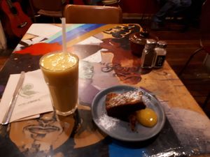 Mango turmeric smoothie and date-cashew slice at Revel! in Auckland