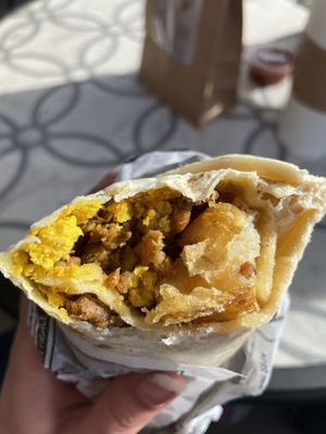 Tofu Scramble+potatoes+chorizo sausage= Vegan Breakfast Burrito  at FeelLove Coffee in Springdale