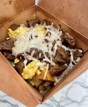 Vegan breakfast cup - tofu scramble, sausage, potatoes and cheese   at FeelLove Coffee in Springdale