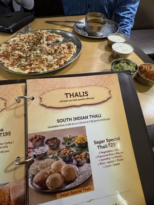 We shared this!! So filling and tasty! Uttapam is like a crepe or pizza with the base of rice  at Sagar Ratna - Connaught Place in New Delhi