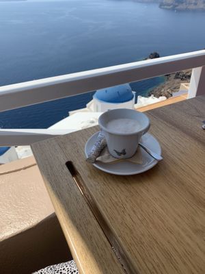 latte with a view at Terpsi N Oia in Santorini