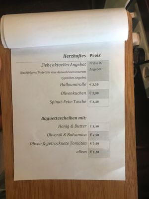 Savory dishes like baguette and olives, vegan pizza snails or Olivemuffins at Carls Laden in Leipzig