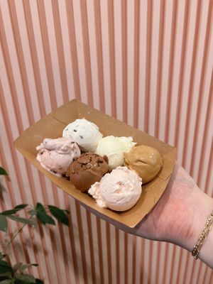 A flight of 6 flavors - comes with your choice of dry topping and drizzle! at Boho Cafe in Montclair