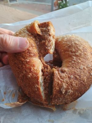 Sea salt bagel with almond butter at Bagelsaurus in Cambridge