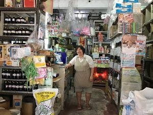 Happy shop keeper. at Whole Sale Shop in Ubun Rachatani