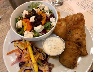 Celeriac “fish” with mango slaw and house salad at MILA in Vancouver