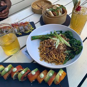 Mila roll, rainbow roll, bao buns, & dan dan noodles at MILA in Vancouver
