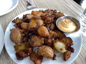 Smashed potatoes   at MILA in Vancouver