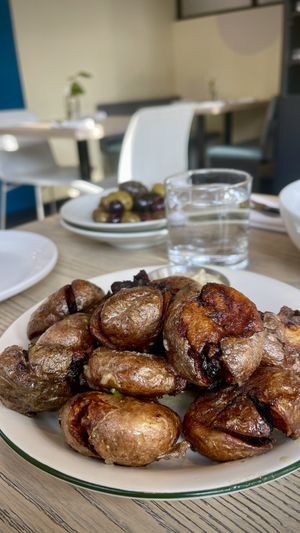 Smashed potatoes   at MILA in Vancouver