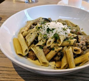Mushroom & Sausage Tagliatelle on Gluten-Free Penne at MILA in Vancouver