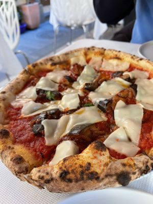 Vegan pizza with aubergine  at Ciro and Sons in Florence