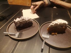 Chocolate brownie oreo cake (left) and pineapple carrot cake (right) at Vrutal - Poblenou in Barcelona