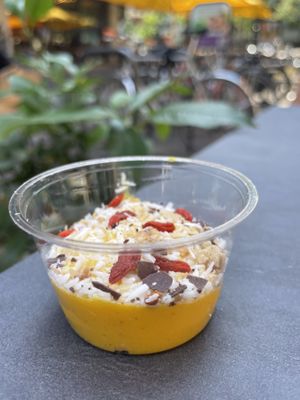 Mango smoothie bowl  at Yuícery - Ehrenstraße in Cologne