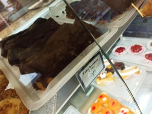 Cañas de hojaldre y chocolate bañadas at Panadería Confitería Inma in Malaga