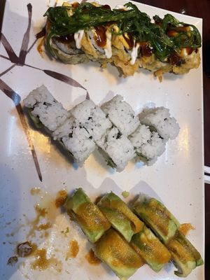 Ignore the center. Top: Vegan shrimp monsoon roll w seaweed atop. Bottom: veggie delight roll. 🍣 yum!  at Yanagi Sushi in Gilbert
