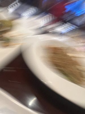 Came out blurry it was steamed gyoza and 3 different rolls: monson, spicy tuna, and one other   at Yanagi Sushi in Gilbert