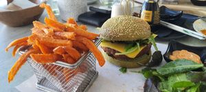 Vegan burger. Alittle bit too dry, but served with vegan spicy mayo. at Hippocampus in Protaras