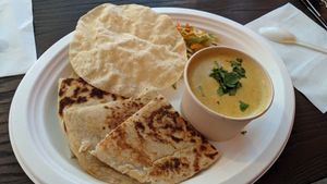 Coconut Kaju curry with naan bread  at Twin Flames in Ellenbrook