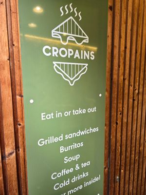 Sign at door at Cropains in Bruges