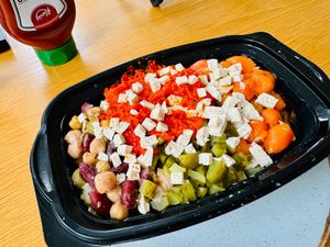 Vegan posno potato with ajvar and tofu "cheese", chickpeas, carrots, et cetera.... at Potato's in Belgrade