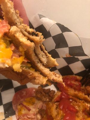 Mid meal on the what the cluck and the chili cheese fries. Overall tasty but some spicy flavor would’ve been ideal.  at Mike's Vegan Cookout in Raleigh