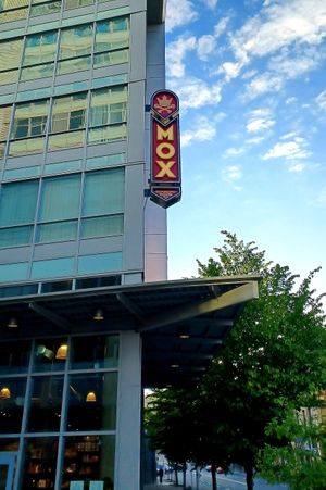 Exterior sign at Mox Boarding House in Portland