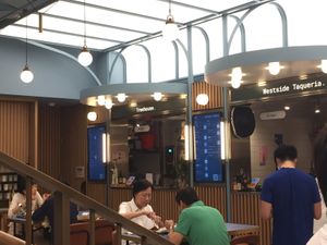 Inside BaseHall - various stalls sharing seating  at Treehouse in Hong Kong Island