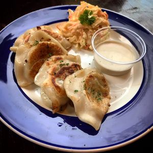 Polish dumplings "Pierogi" 
served with coleslaw and garlic sauce.

V at The Idle Bakery & Cafe in Bradford