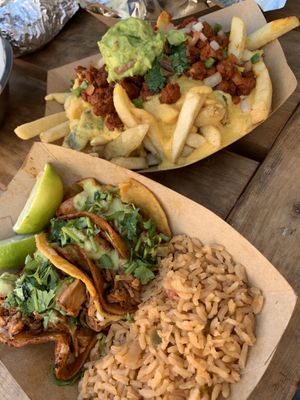 Birria tacos, and loaded fries   at Pepitas Vegan Taqueria in Denton