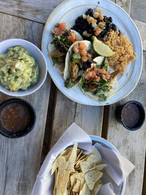 Soy chicken tacos with side of guacamole  at Pepitas Vegan Taqueria in Denton