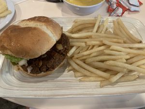 Mexican burger was spicy but good. Fries very undercooked    at Pepitas Vegan Taqueria in Denton