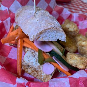 Banh Mi: Grilled Sesame-Ginger Marinated Tofu, Freshly-Pickled Veggies, Cilantro, Sriracha Mayo on a House-Made Baguette w/ Potato Cakes. (Kalamazoo Vegan Chef Challenge 5/25) at Studio Grill in Kalamazoo