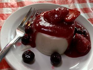 Panna Cotta w/ Berry Compote & mixed Berries. It's so good, we had it FIVE times during the challenge!  We wish it was on their regular menu!  (Kalamazoo Vegan Chef Challenge 5/25) at Studio Grill in Kalamazoo
