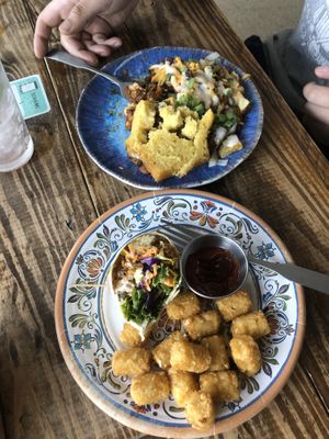 Hash and wrap with tater tots  at HASH - Vegan Eats SA in San Antonio