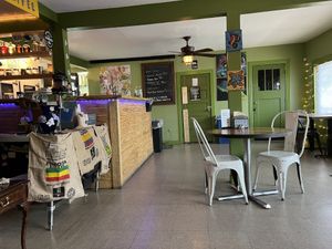 Cute inside. Just a few tables, and a sofa seating area  at HASH - Vegan Eats SA in San Antonio