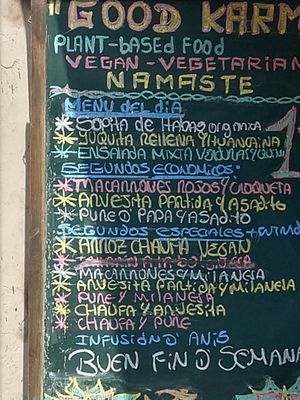 Menu board outside at Good Karma in Lima