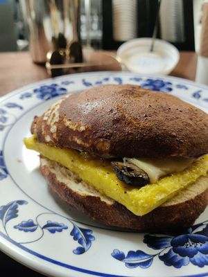 Vegan egg, cheeze and mushrooms bagel at coffee me crazy in San Antonio