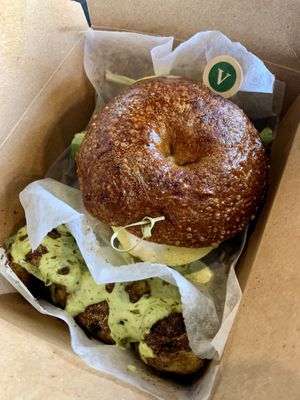 Vegan Bagel Breakfast Sandwich + Smashed Potatoes  at Ghostlight Coffee - Midtown in Dayton