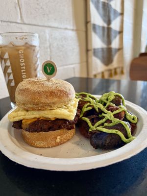Vegan breakfast sandwich with a side of the smash brown potatoes   at Ghostlight Coffee - Midtown in Dayton
