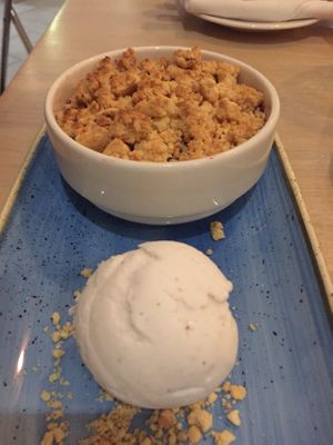 Apple and summer berries crumble with vegan vanilla ice cream at Solent Hotel & Spa in Fareham