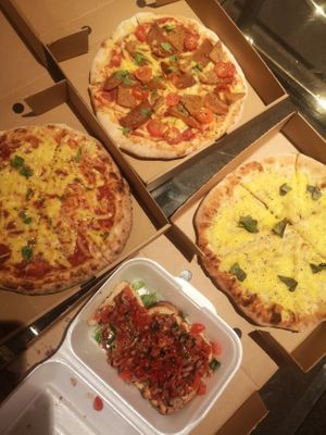 Vegan bruschetta, vegan meaty, vegan margherita and garlic bread with vegan mozarella.  at Pizza Grazie  in Blackpool