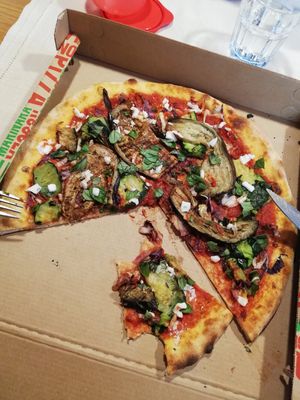 Takeaway vegetable pizza (I added the vegan feta and the basil) at Pizzeria Martinelli in Ronzo Chienis